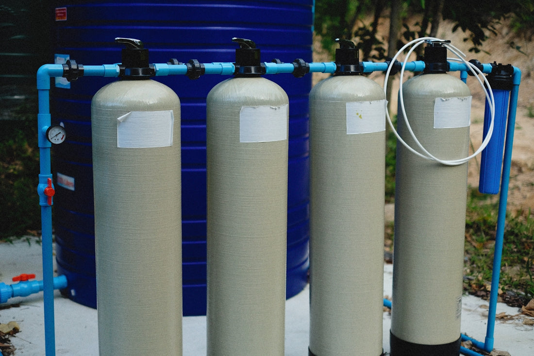 a couple of water tanks sitting next to each other